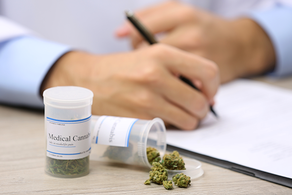 Doctor writing prescription