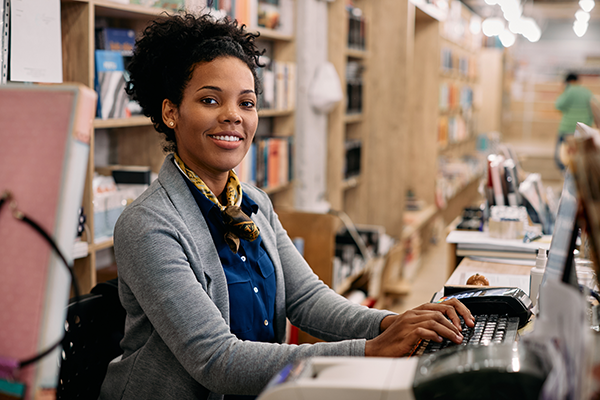 Librarian working on a computer