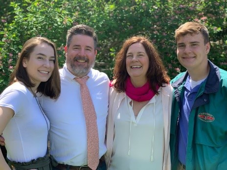 Photo of the Allens, from left to right: Maddy, Bill, Becca, and Owen