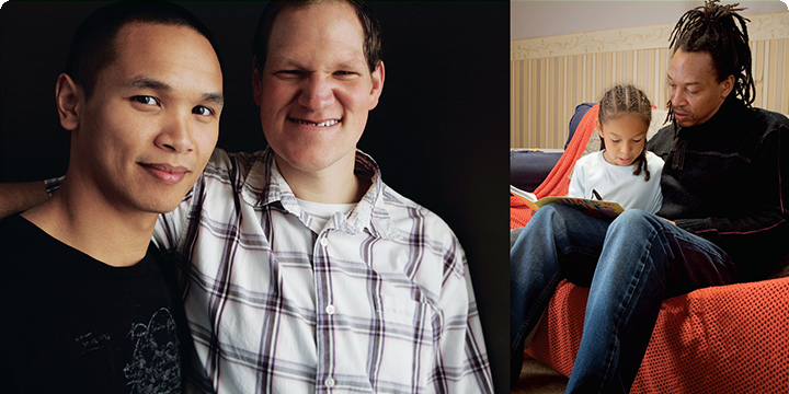 Two men smiling.