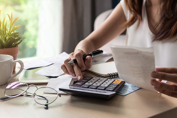 Woman paying bills